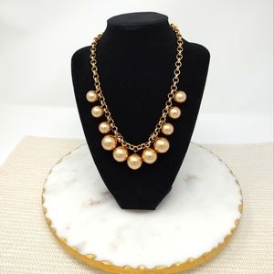 Monet gold tone and blush pearl bauble bead mixed media necklace